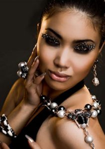 Model showcasing bold statement pieces from custom jewelry design.